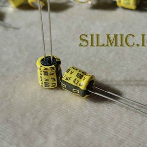 خازن گرید صوتی 4.7 میکرو فاراد 100 ولت ELNA مینیاتوری RC2 yellow استاندارد