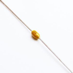 100NF/50V/20%  AXIAL
