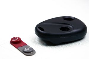 ریموت  REMOTE PLASTIC CASE 2KEYS ROUND BLACK