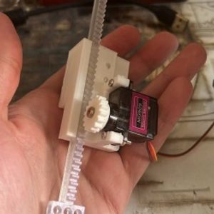 اکچویتور خطی180 درجه مینی سروو موتور MG90S/SG90 اهرم خطی mini linear actuator / مبدل حرکت دورانی سروو موتور به حرکت خطی با دقت و نیروی بالا ( بازوی خطی سروو موتور ) کورس حرکتی 2.5 سانتی متر