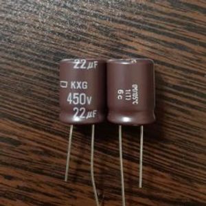 Nippon 450V 22uF - خازن الکترولیت 450 ولت 22 میکرو فاراد سری KXG ابعاد 21 * 16