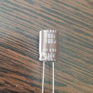 NIPPON 100V 100 uF - خازن 100 ولت 100 میکرو فاراد سری KMQ
