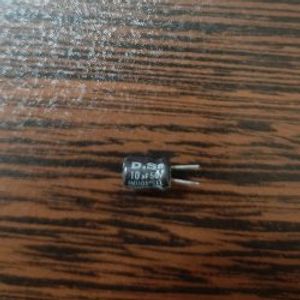D.S 50V 10uF - خازن الکترولیت 50 ولت 10 میکرو فاراد