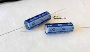خازن اکسیال 100 میکرو فاراد 160 ولت nichicon ژاپن سری vx