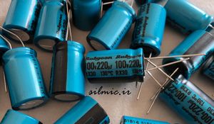 خازن 130 درجه 220 میکرو فاراد 100 ولت ژاپنی Rubycon سری RX30 با ابعاد کوچک