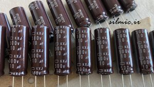 خازن 10 میکرو فاراد 500 ولت nippon ژاپن سری kxj با طول عمر بسیار بالا