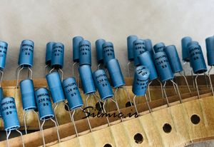خازن 33 میکرو فاراد 50 ولت ساخت philips آلمان سری 036 RSB کوپلاژ بای پس تایم