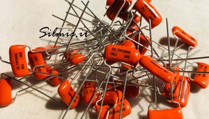 خازن افسانه ای 680 پیکو فاراد 400 ولت AC ساخت SPRAGUE سری orange drop