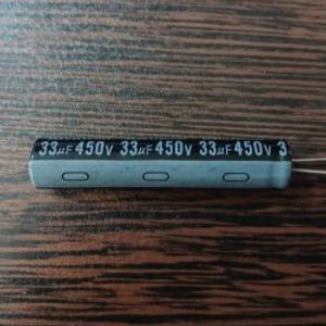 CAP 450V 33uF - خازن الکترولیت 450 ولت 33 میکرو فاراد ابعاد 50 * 10
